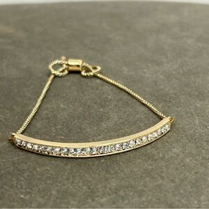 PAVE BAR PULL THROUGH GOLD-TONE CRYSTAL RHINESTONE DIAMANTÉ TENNIS BRACELET